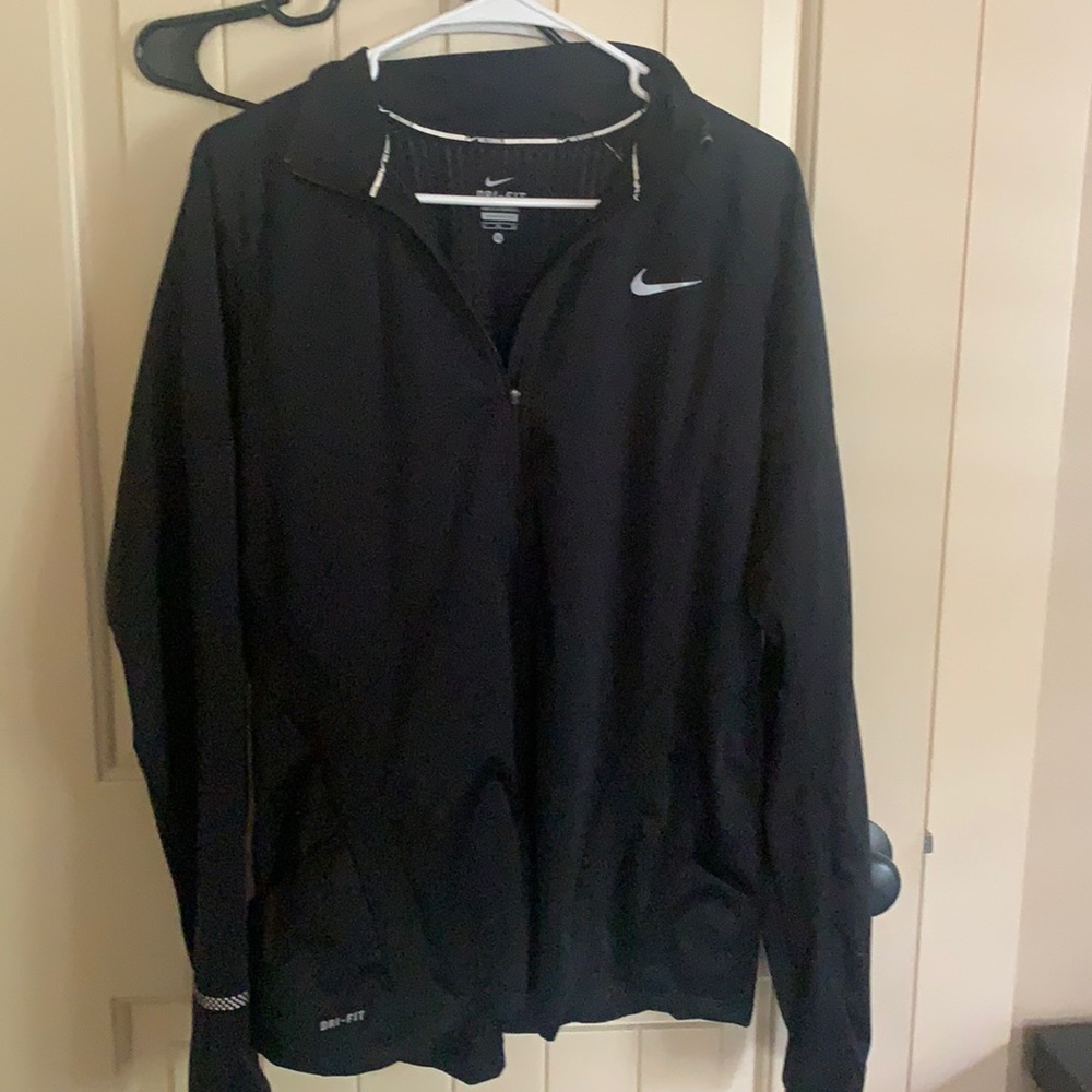 Light Nike dri-fit jacket.